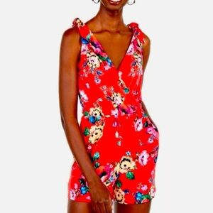 Romper from Express with adjustable straps and pockets size large